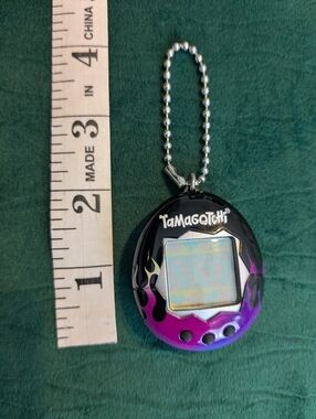 Tamagotchi The Virtual Reality Pet Pink and Purple Flames